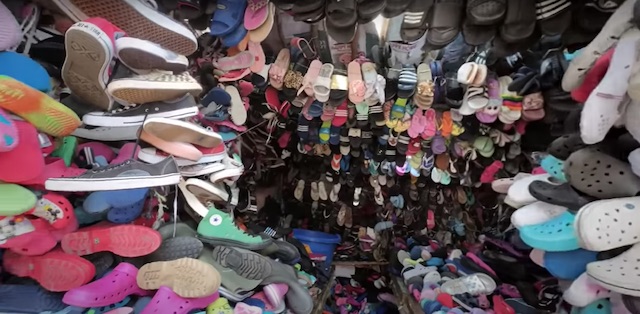shoe themed shop in the toi market in nairobi kenya selling lots of second hand shoes